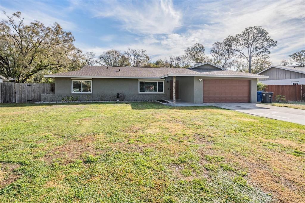 18631 San Rio Circle Lutz, FL 33549 - Photo 39 of 39 a view of a house with a yard