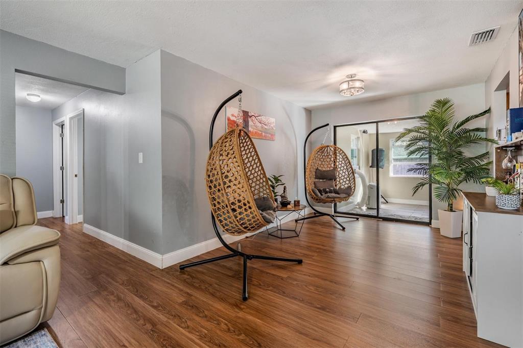 18631 San Rio Circle Lutz, FL 33549 - Photo 8 of 39 a view of a room with furniture and wooden floor
