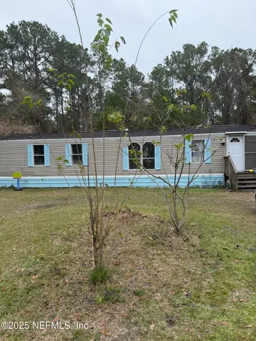 a view of outdoor space with lots of trees