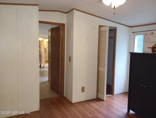 a kitchen with a sink cabinets and appliances