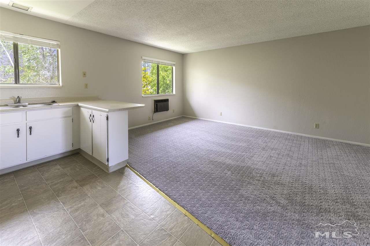 230 Marsh Avenue Reno, NV 89509 - Photo 8 of 12 a view of a kitchen with a sink a dishwasher and a window