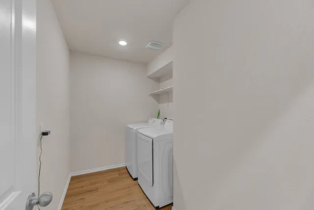 a view of hallway with stairs