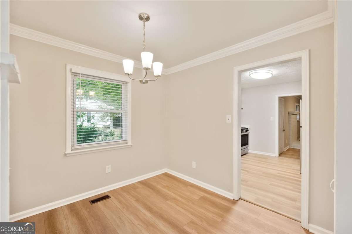 752 Jefferson Avenue Southwest Atlanta, GA 30315 - Photo 11 of 30 a view of an empty room with a window
