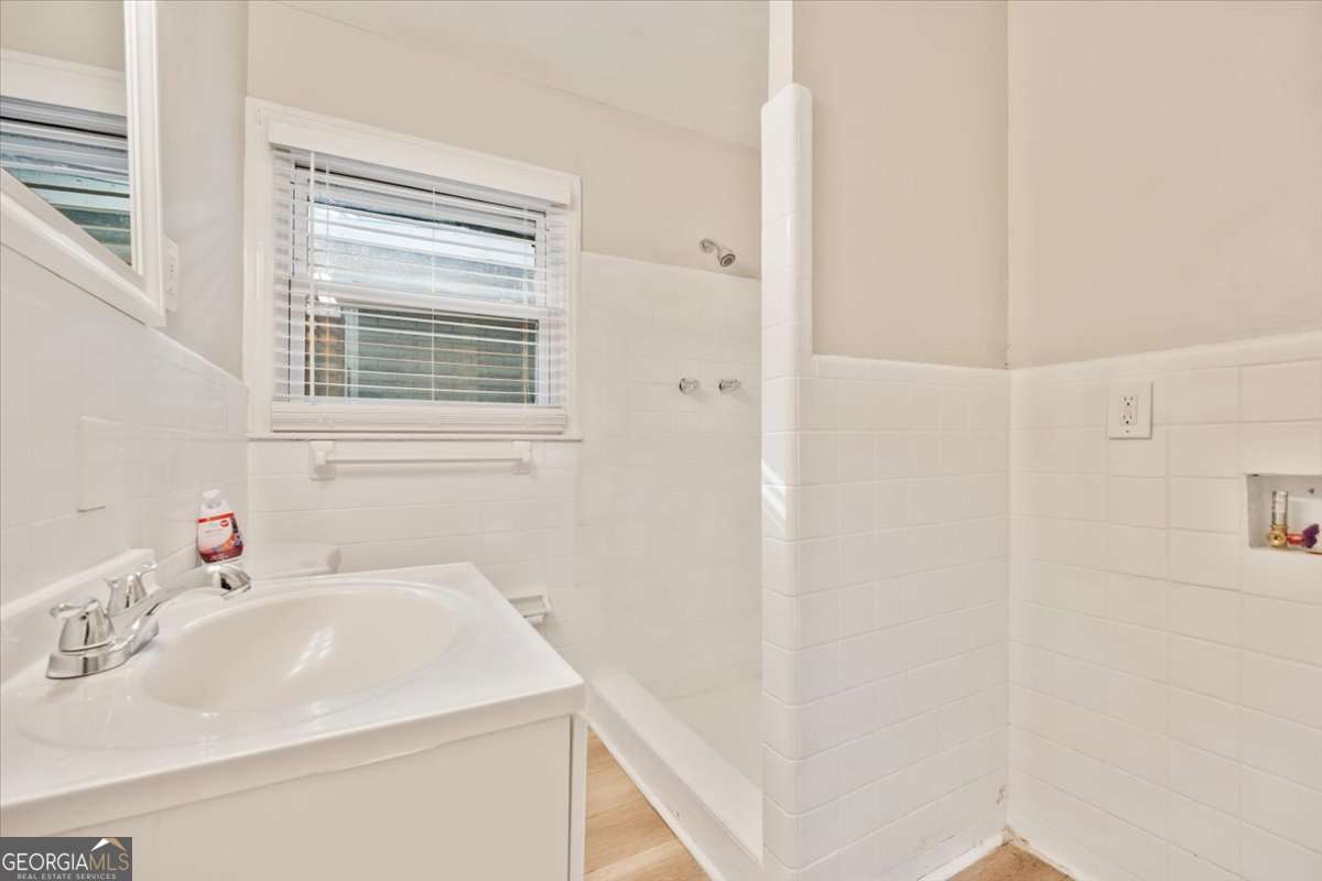 752 Jefferson Avenue Southwest Atlanta, GA 30315 - Photo 12 of 30 a bathroom with a sink and a vanity