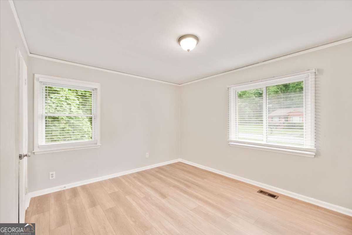 752 Jefferson Avenue Southwest Atlanta, GA 30315 - Photo 16 of 30 a view of an empty room with a window