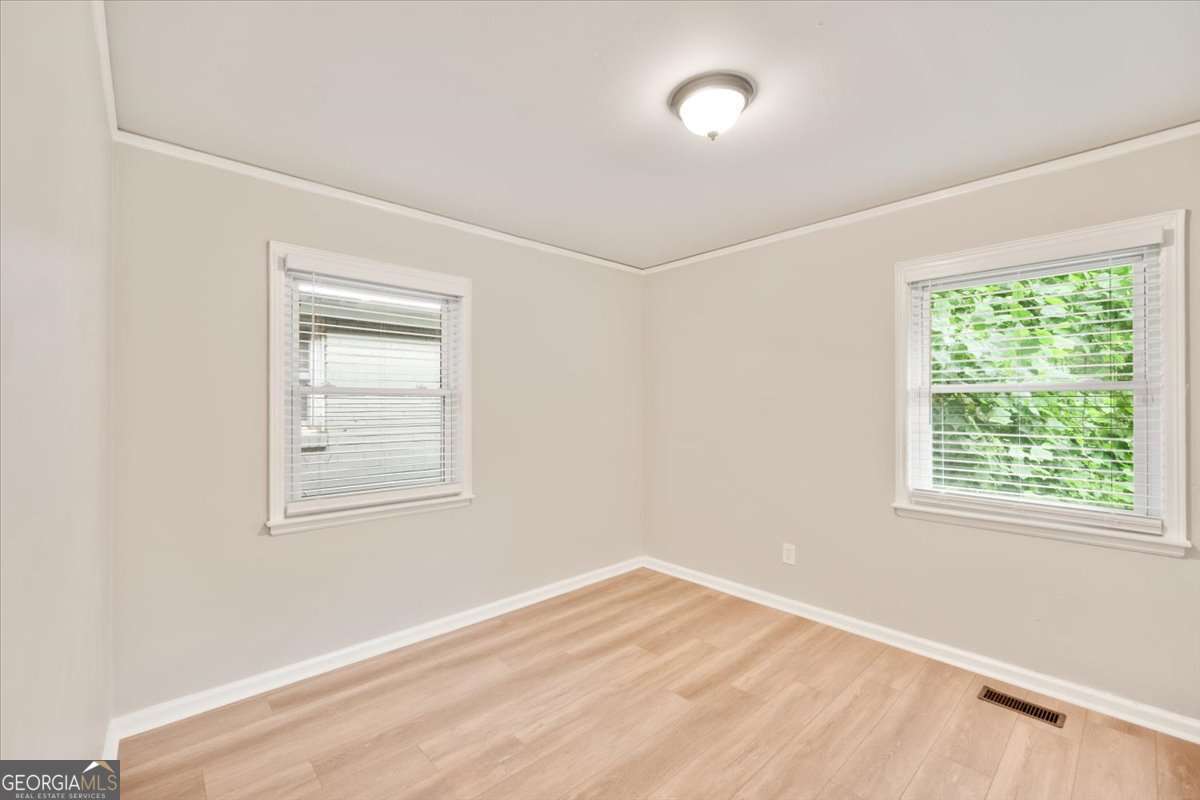 752 Jefferson Avenue Southwest Atlanta, GA 30315 - Photo 18 of 30 an empty room with a window