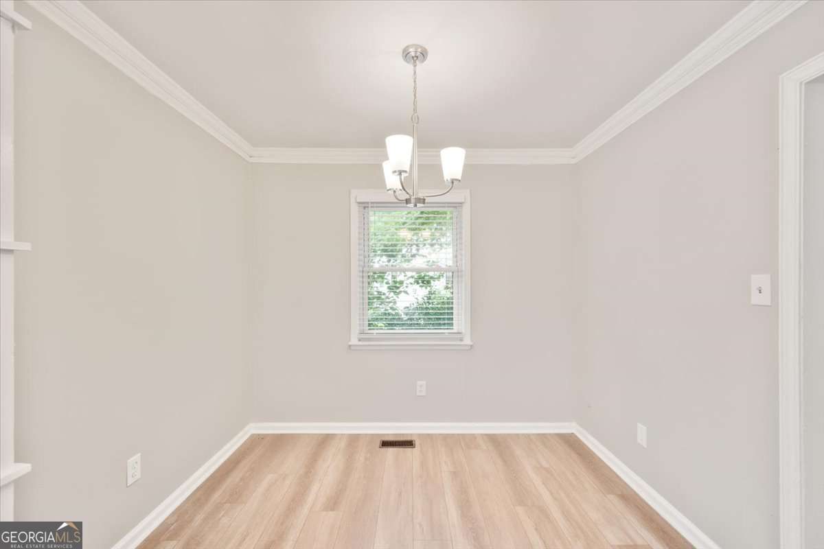752 Jefferson Avenue Southwest Atlanta, GA 30315 - Photo 10 of 30 an empty room with a window