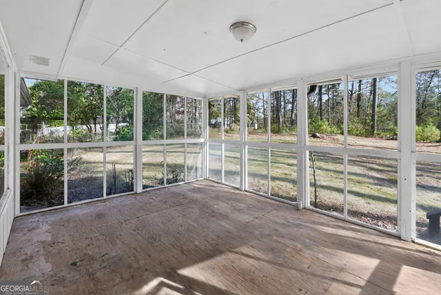a view of a house with a large window