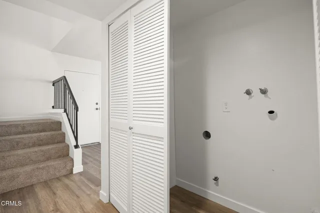 a view of entryway with stairs