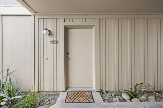 a view of a livingroom with wooden floor
