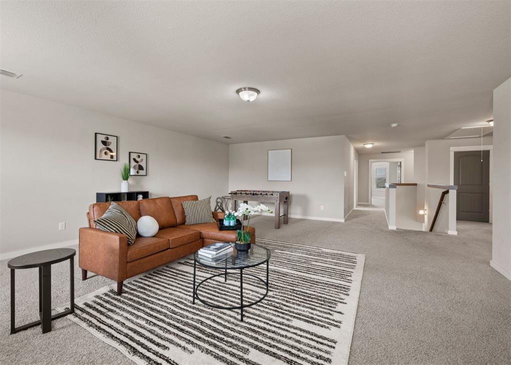 2521 Boot Jack Road Fort Worth, TX 76177 - Photo 27 of 40 a living room with furniture and a dining table with kitchen view