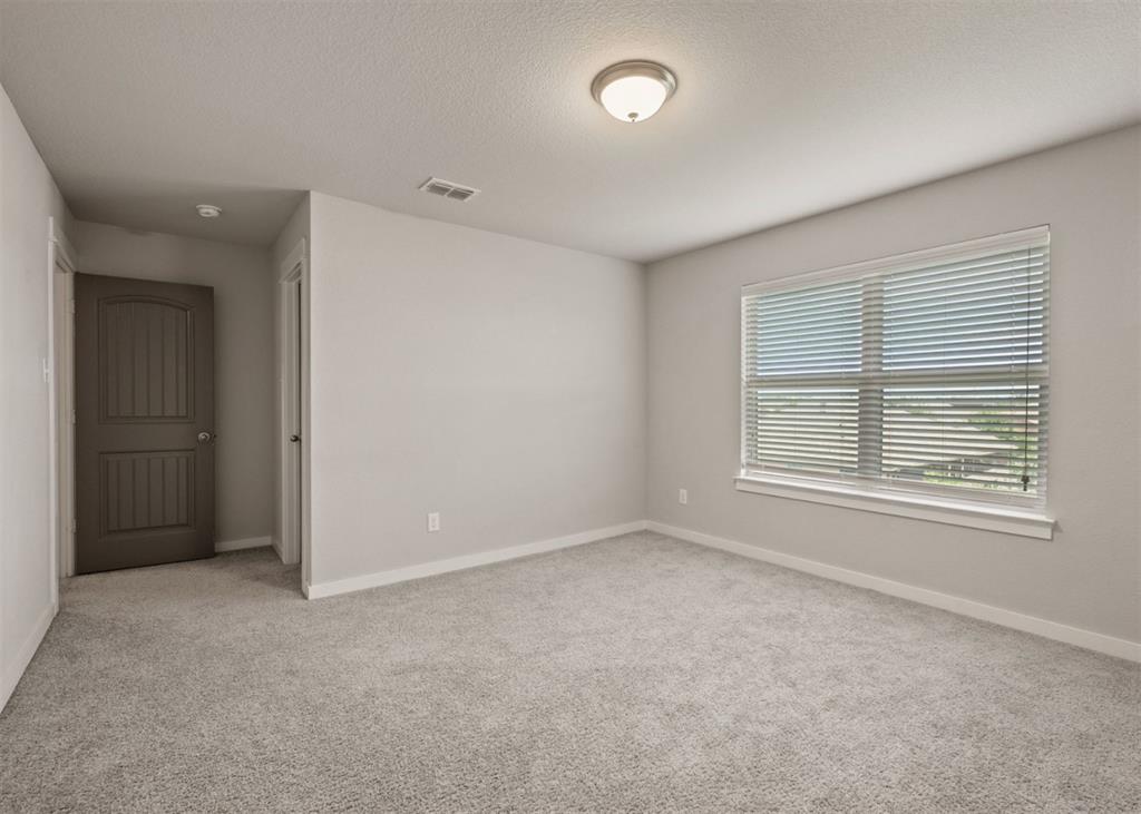 2521 Boot Jack Road Fort Worth, TX 76177 - Photo 32 of 40 an empty room with a window