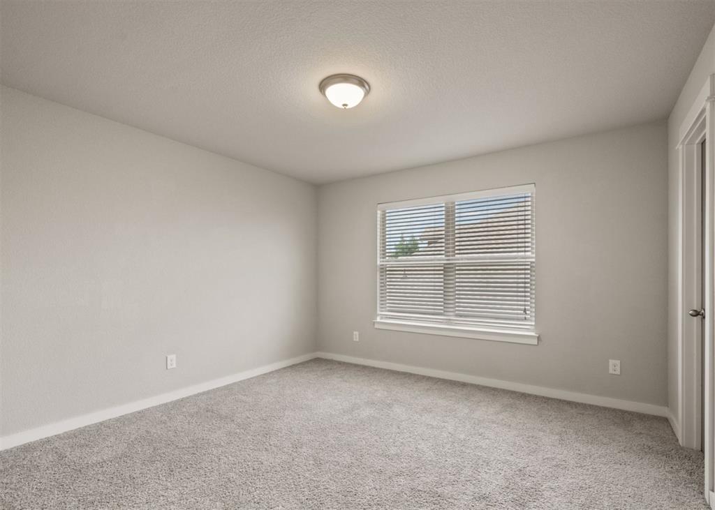 2521 Boot Jack Road Fort Worth, TX 76177 - Photo 33 of 40 an empty room with a window