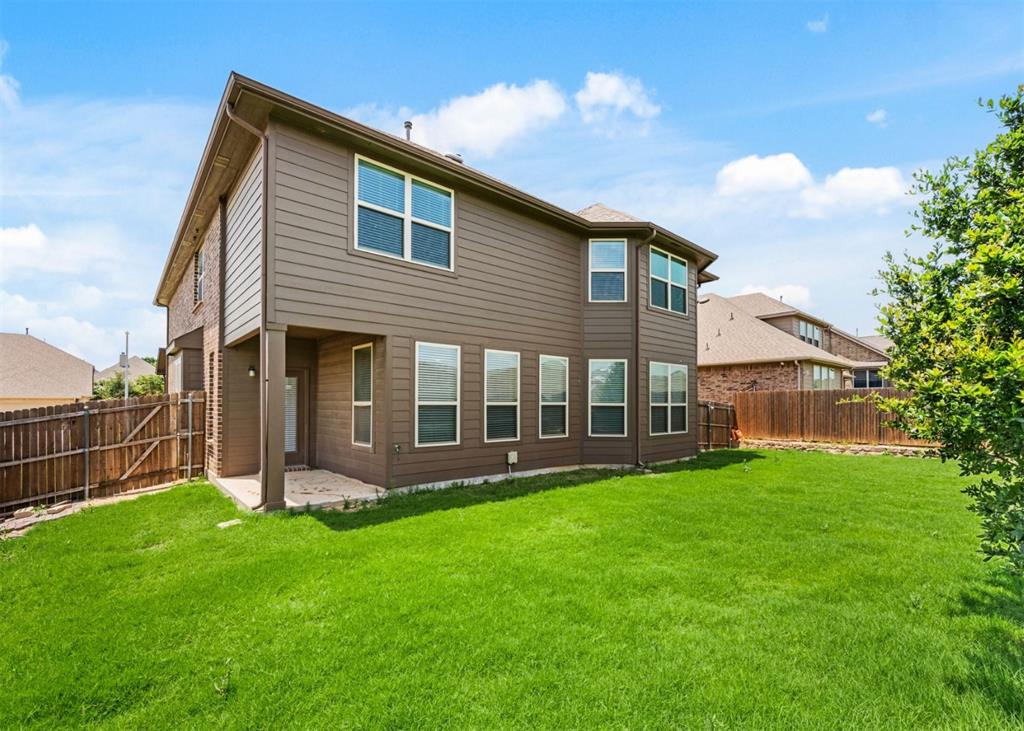 2521 Boot Jack Road Fort Worth, TX 76177 - Photo 38 of 40 a view of a house with a yard and sitting area