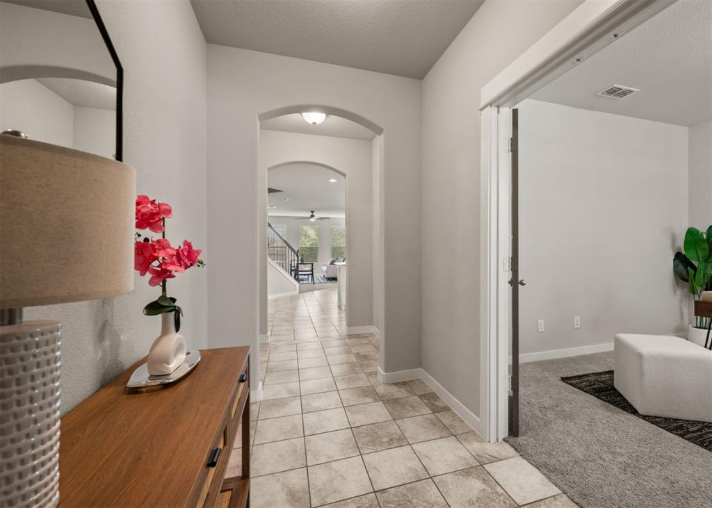 2521 Boot Jack Road Fort Worth, TX 76177 - Photo 7 of 40 a living room with furniture and flowers