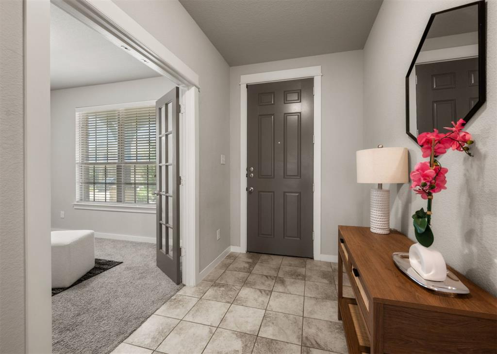 2521 Boot Jack Road Fort Worth, TX 76177 - Photo 8 of 40 a living room with furniture and a potted plant