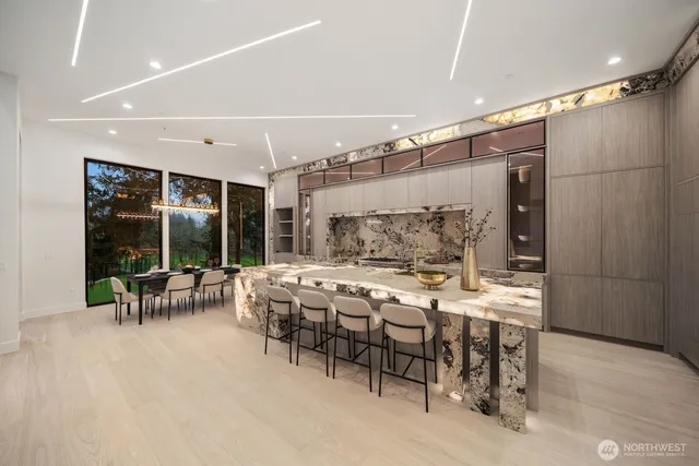 a large room with furniture and a large window