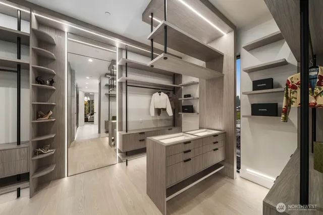 a kitchen with a refrigerator and a sink