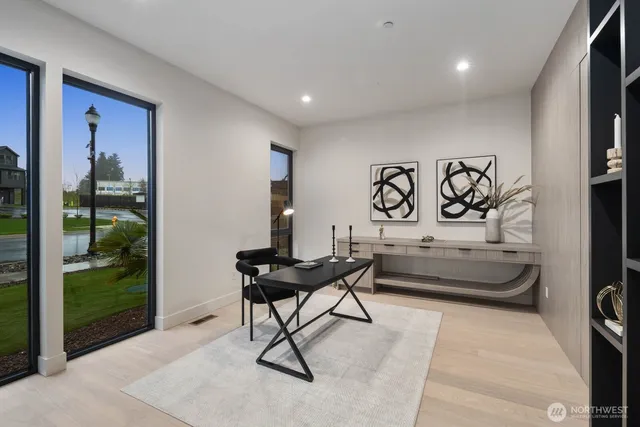 a view of a livingroom with furniture and window