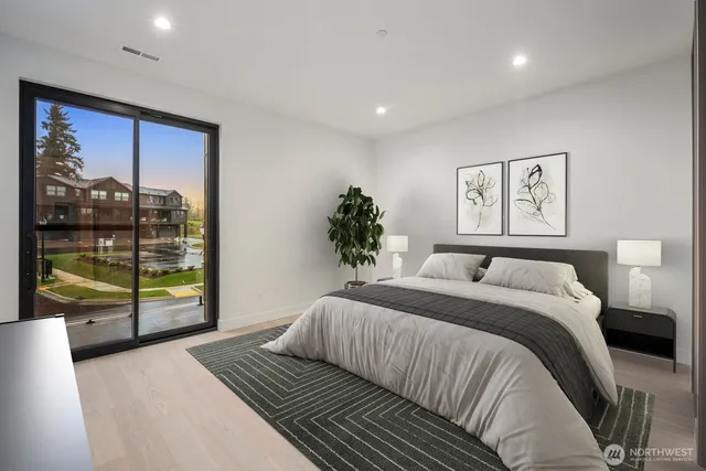 a bathroom with a bathtub a toilet a sink and shower