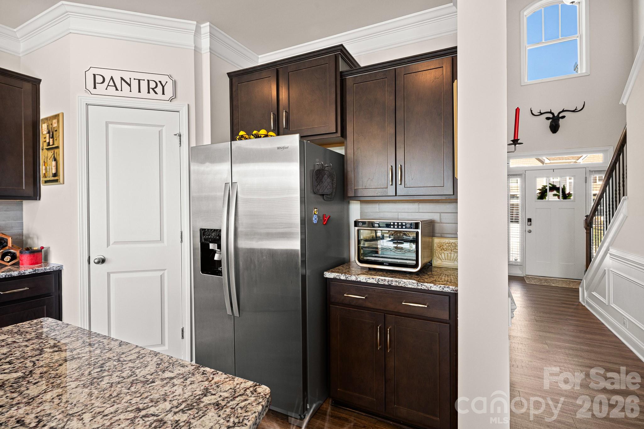 199 Fox Cove Road Hendersonville, NC 28792 - Photo 12 of 48 a kitchen with stainless steel appliances granite countertop a refrigerator and a stove