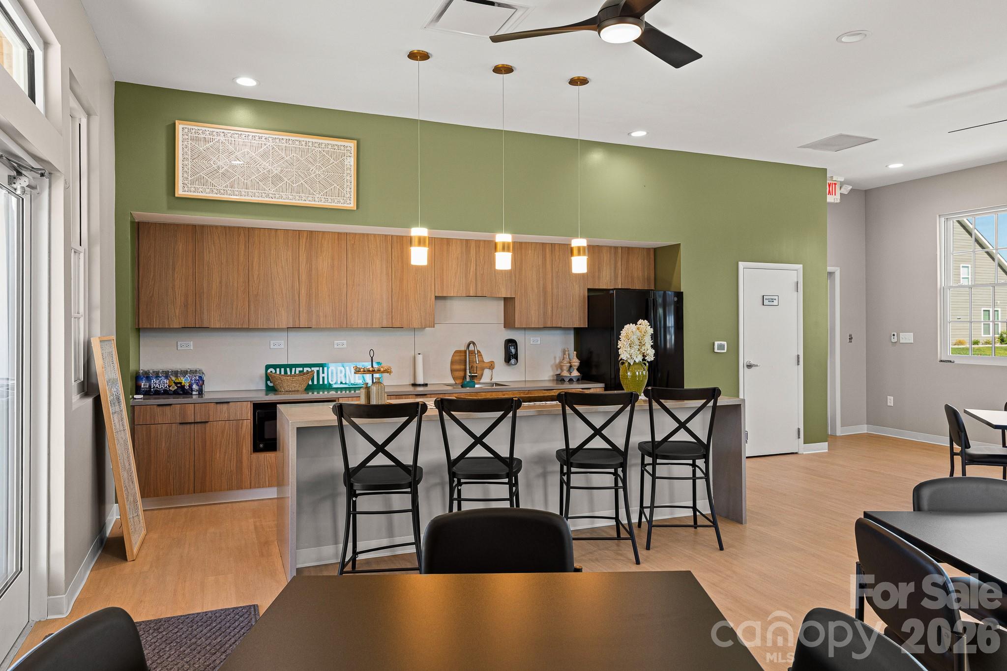199 Fox Cove Road Hendersonville, NC 28792 - Photo 39 of 48 a view of a dining room with furniture and a chandelier