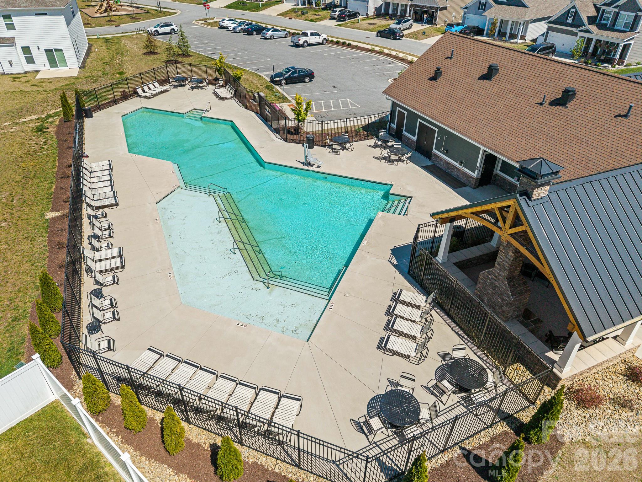 199 Fox Cove Road Hendersonville, NC 28792 - Photo 43 of 48 an aerial view of a house with a swimming pool