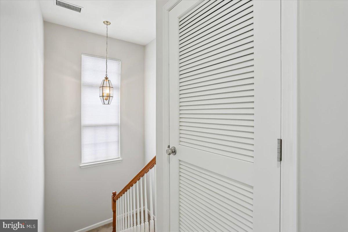 723 Main Street, Unit 723B Gaithersburg, MD 20878 - Photo 17 of 70 Light filled staircase to the upstairs