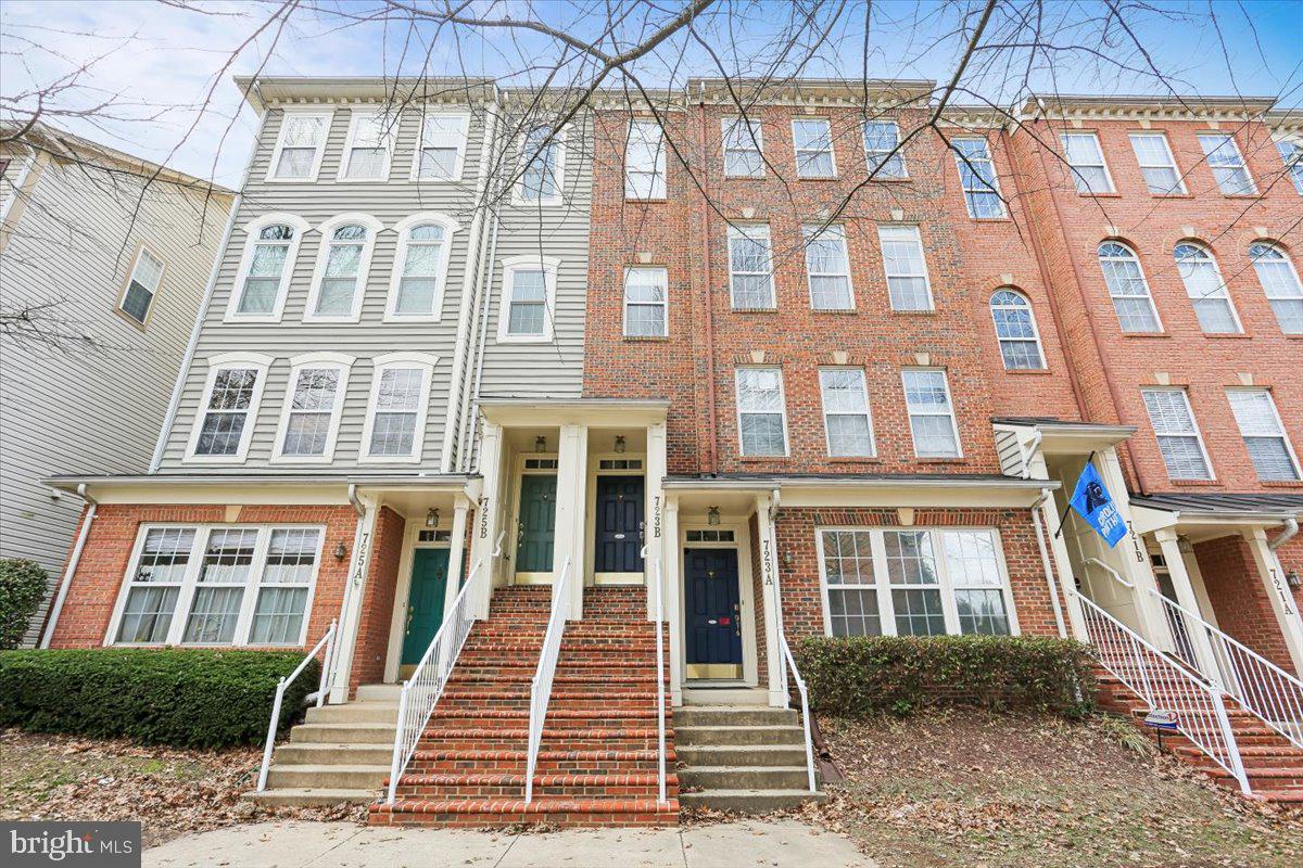 723 Main Street, Unit 723B Gaithersburg, MD 20878 - Photo 2 of 71 front view of a brick building