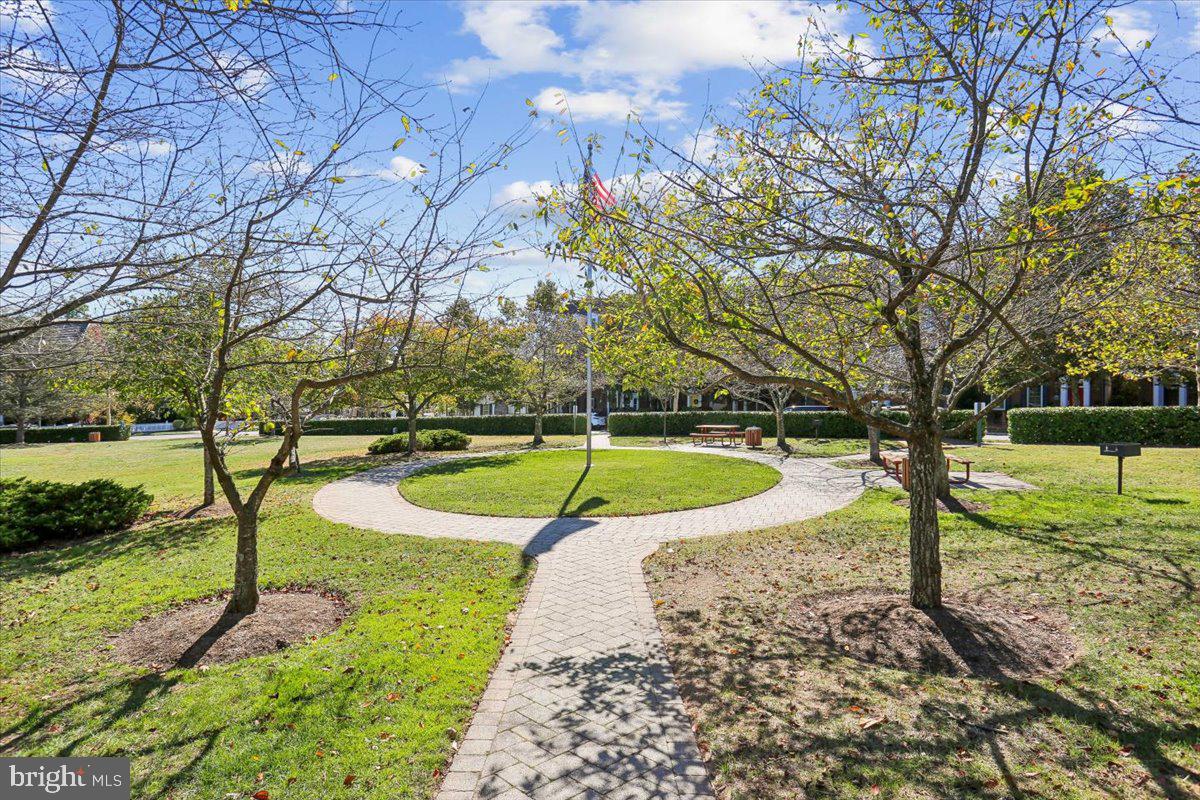 723 Main Street, Unit 723B Gaithersburg, MD 20878 - Photo 64 of 71 a view of a swimming pool with a yard