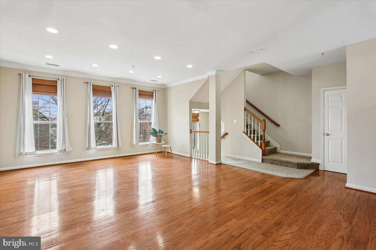 723 Main Street, Unit 723B Gaithersburg, MD 20878 - Photo 67 of 71 a view of an entryway with wooden floor