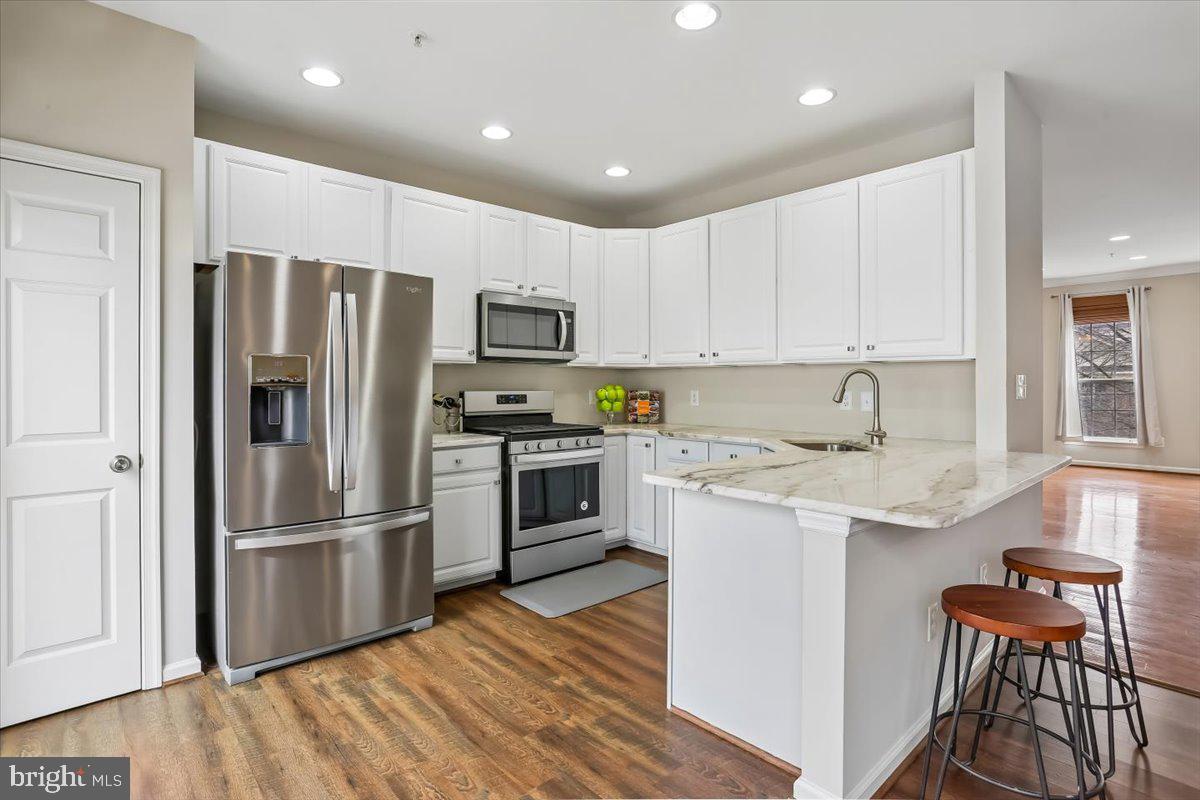 723 Main Street, Unit 723B Gaithersburg, MD 20878 - Photo 8 of 71 Stainless steel appliances, updated kitchen