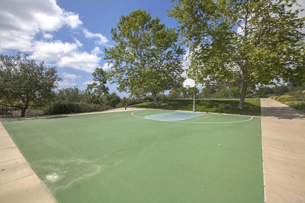 Avenida Apice Rancho Santa Fe, CA 92067 - Photo 18 of 20 a view of a green field with wooden fence