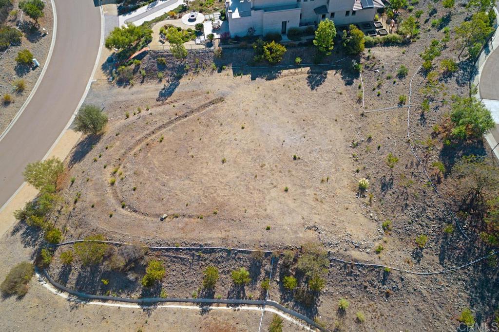 Avenida Apice Rancho Santa Fe, CA 92067 - Photo 2 of 20 a view of a yard with wooden fence