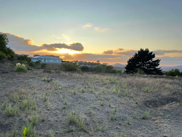 a view of ocean and mountains