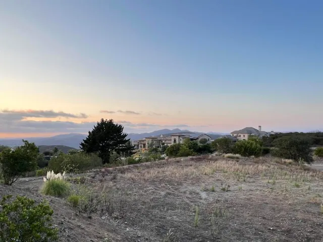 a front view of a building with street view