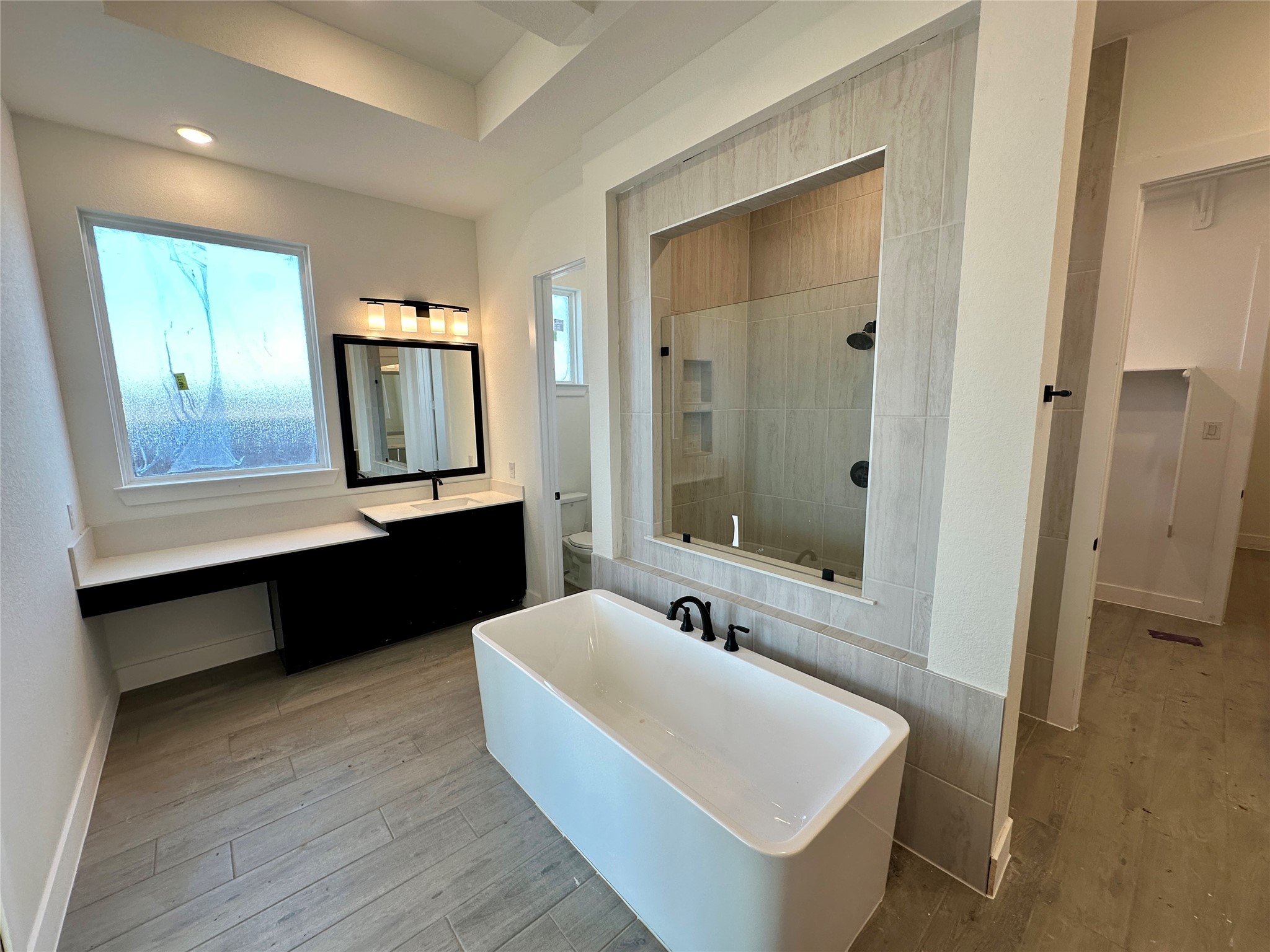 485 Lone Ranger Drive Montgomery, TX 77316 - Photo 11 of 32 a bathroom with a sink and a mirror