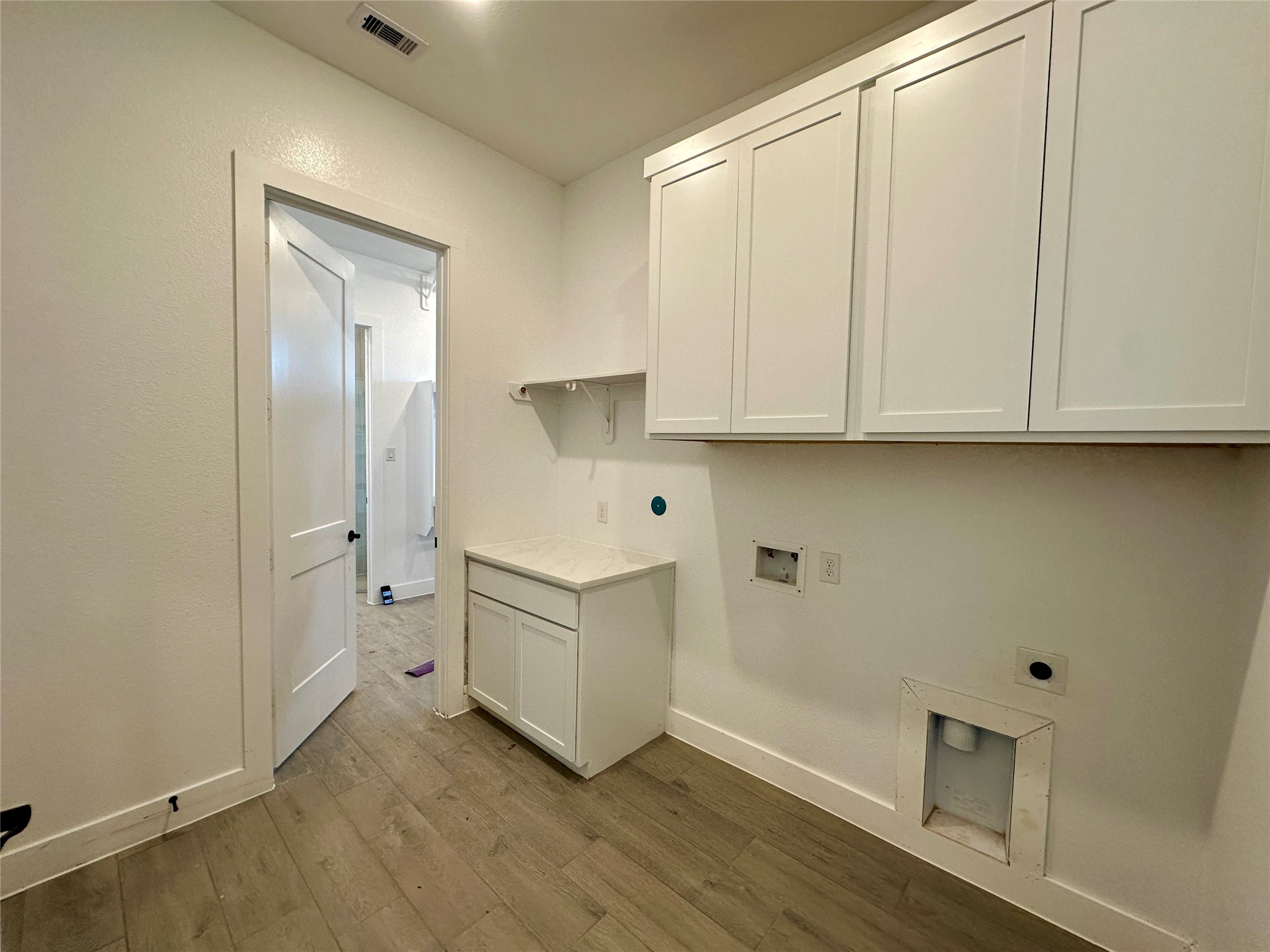 485 Lone Ranger Drive Montgomery, TX 77316 - Photo 22 of 32 a view of cabinets and wooden floor