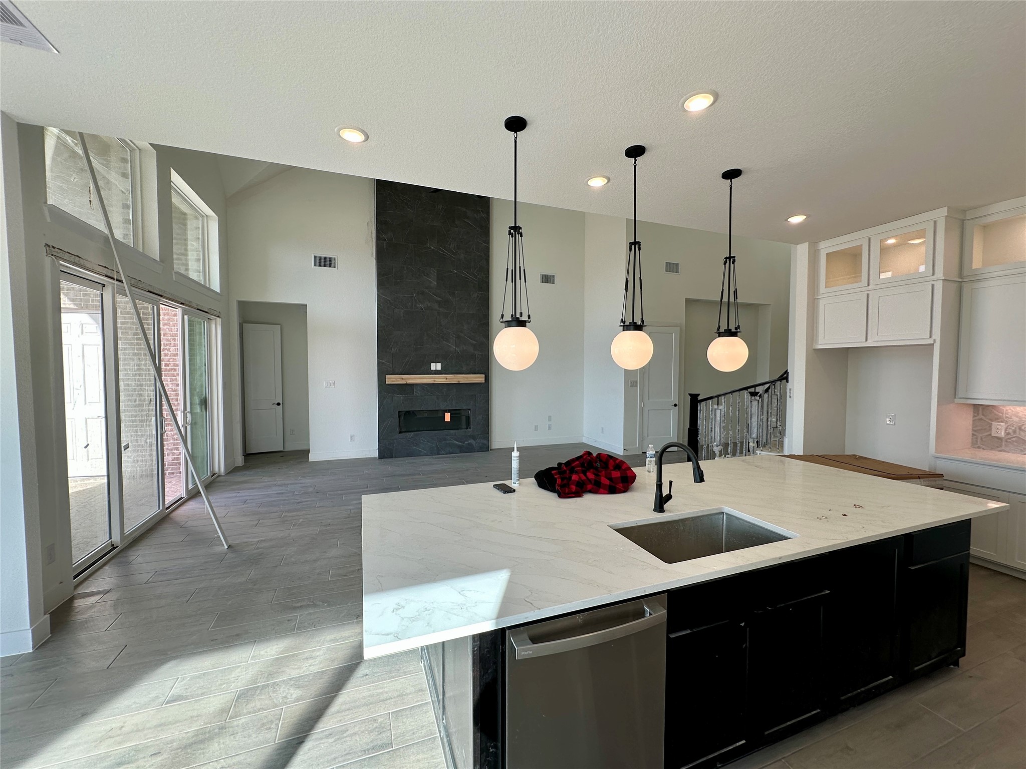 485 Lone Ranger Drive Montgomery, TX 77316 - Photo 5 of 32 a kitchen with a sink cabinets and window