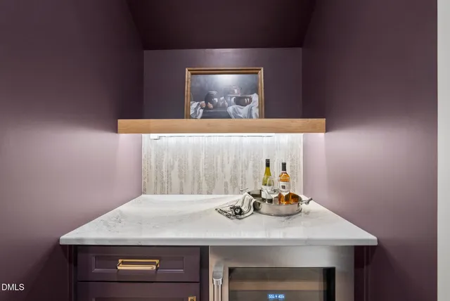 a window with cabinets and wooden floor