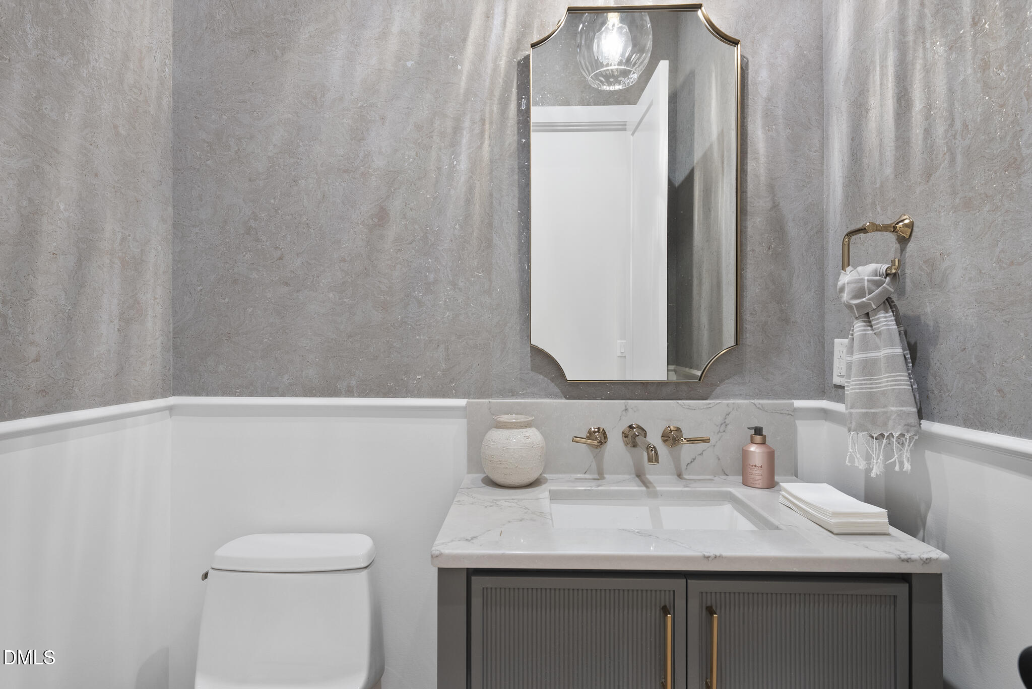 7000 North Ridge Drive Raleigh, NC 27615 - Photo 42 of 79 a bathroom with a sink vanity and a toilet
