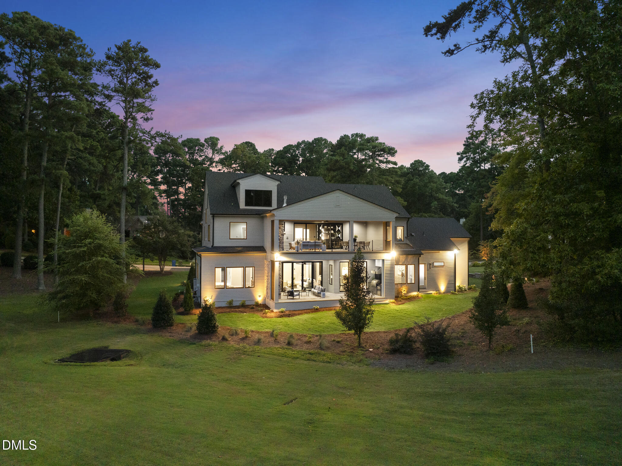 7000 North Ridge Drive Raleigh, NC 27615 - Photo 72 of 79 a front view of a house with a garden