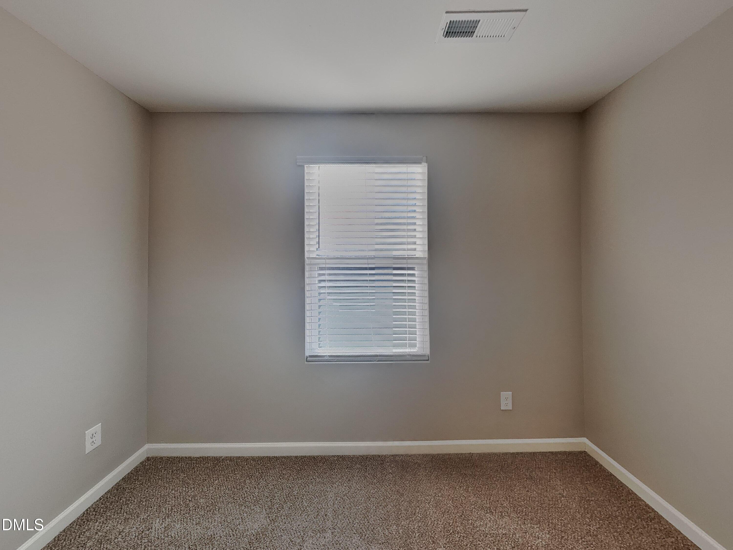 30 Gold Rush Court Clayton, NC 27527 - Photo 13 of 20 an empty room with a window