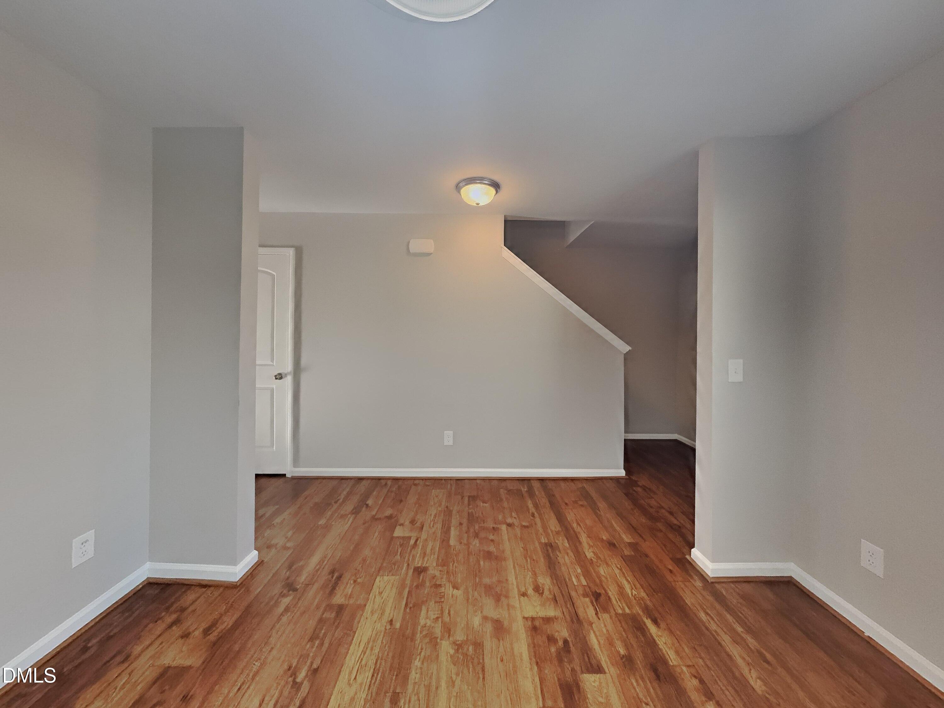 30 Gold Rush Court Clayton, NC 27527 - Photo 3 of 20 a view of empty room with wooden floor