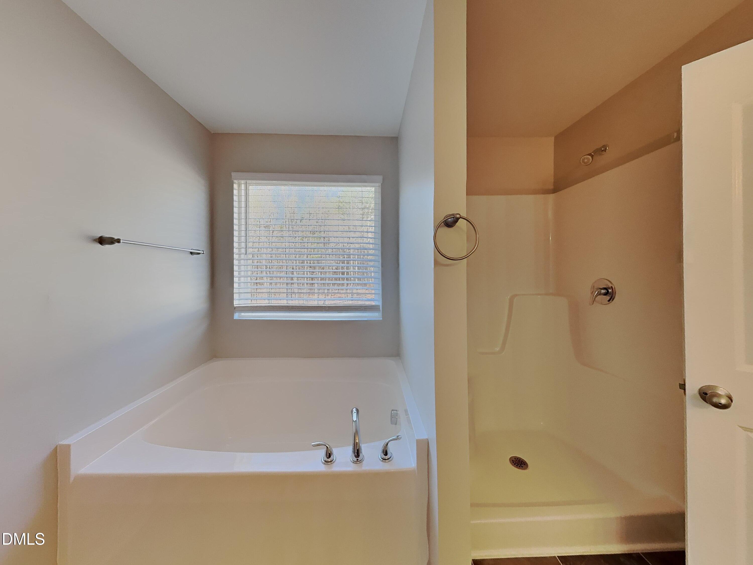30 Gold Rush Court Clayton, NC 27527 - Photo 10 of 20 a bathroom with a bathtub