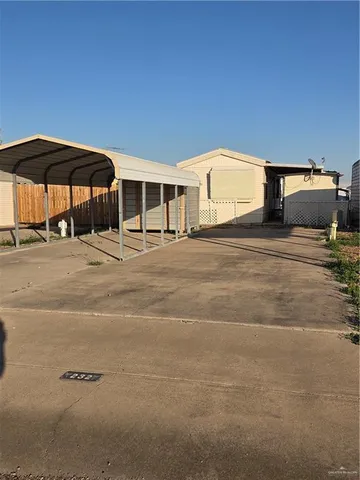 a view of a balcony with an outdoor space