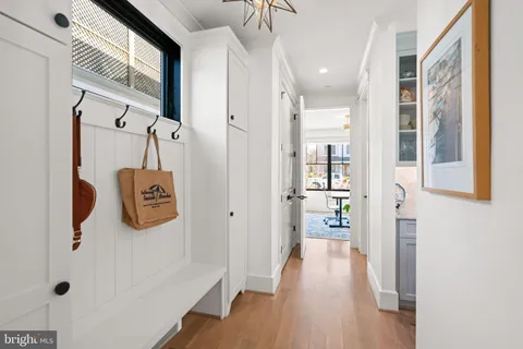 a bathroom with a sink a toilet and a shower curtain