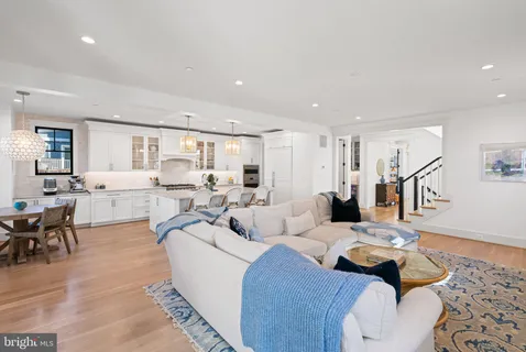 a view of kitchen island with furniture and wooden floor