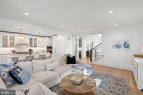 a view of walk in closet with clothes