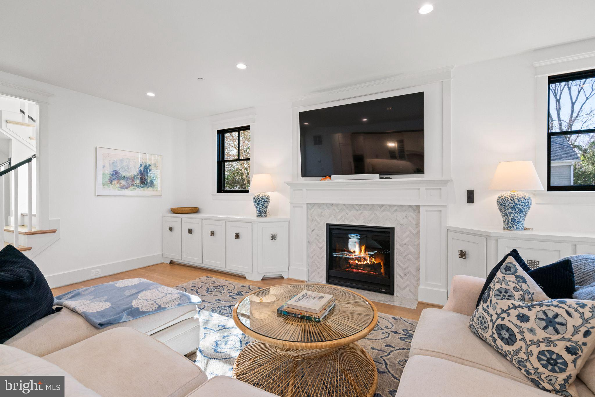 4529 Rosedale Avenue Bethesda, MD 20814 - Photo 32 of 123 a living room with furniture and a fireplace